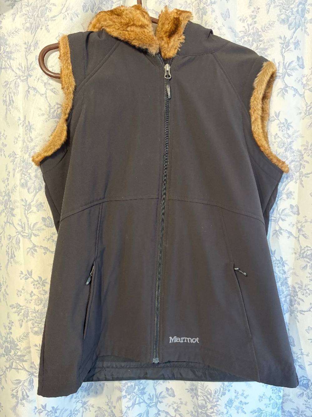 Beautiful black marmot vest with fur lining worn once